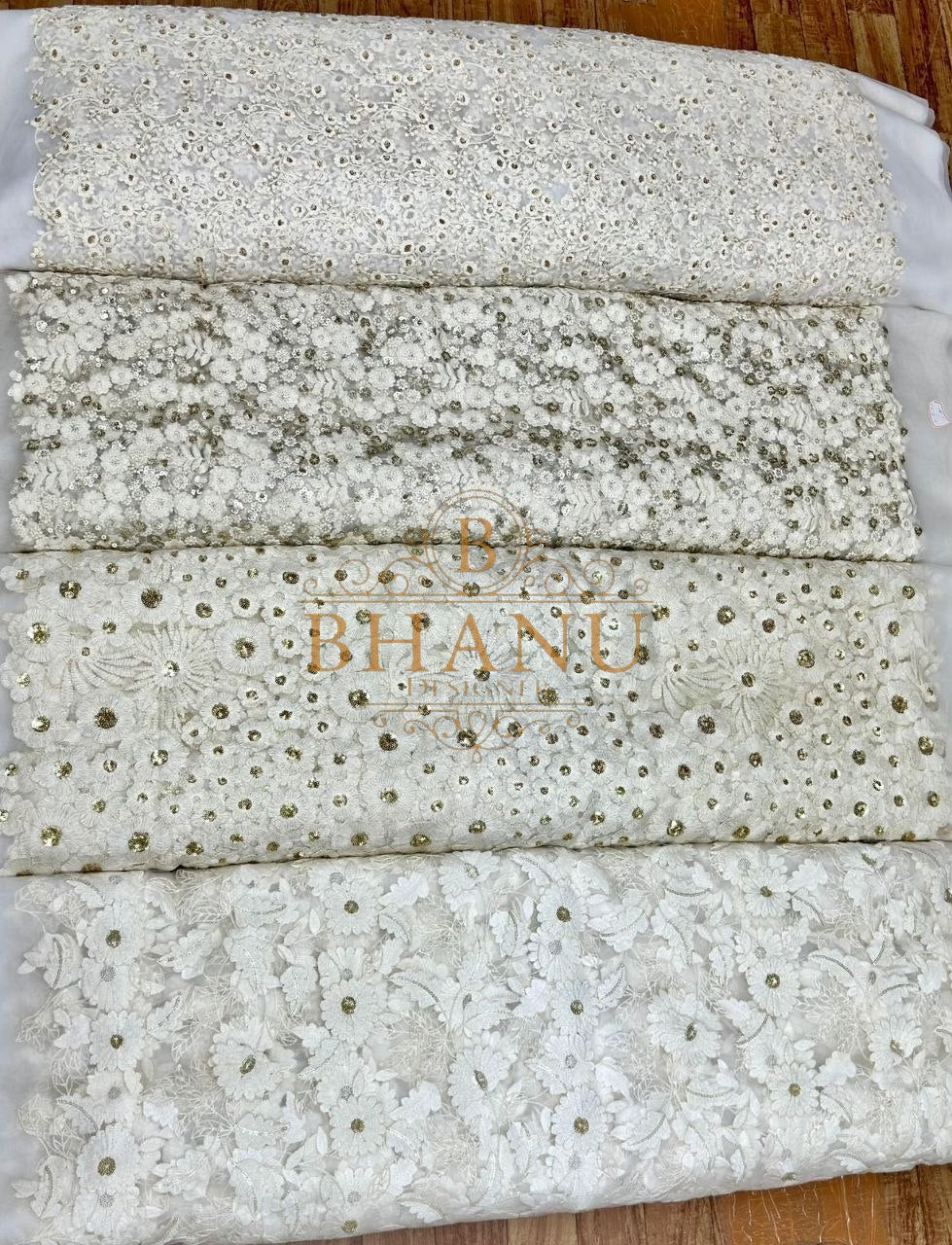 Ivory cutwork with sequin and mirror stripes - fabric by the metre