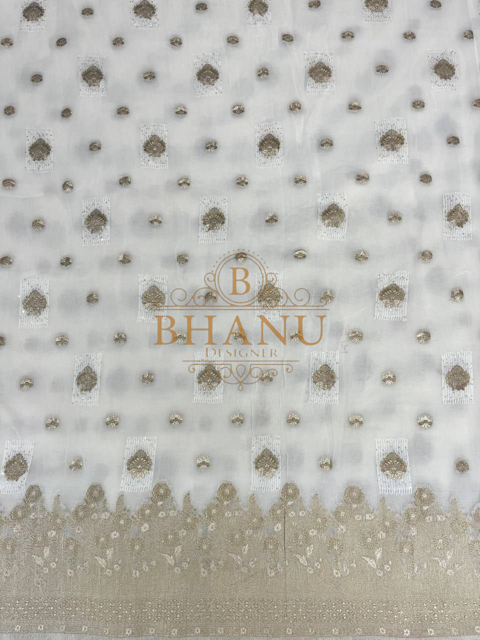 Ivory with gold butti set in rows - fabric by the metre