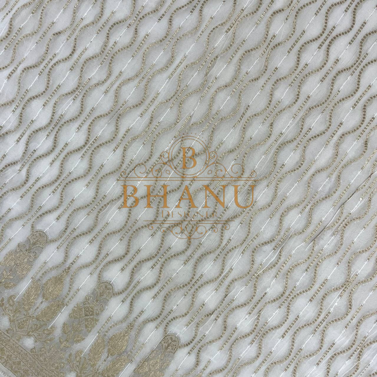 Ivory with gold wave work - fabric by the metre