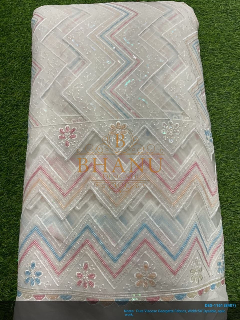 White with pastel chevron and floral work - fabric by the metre
