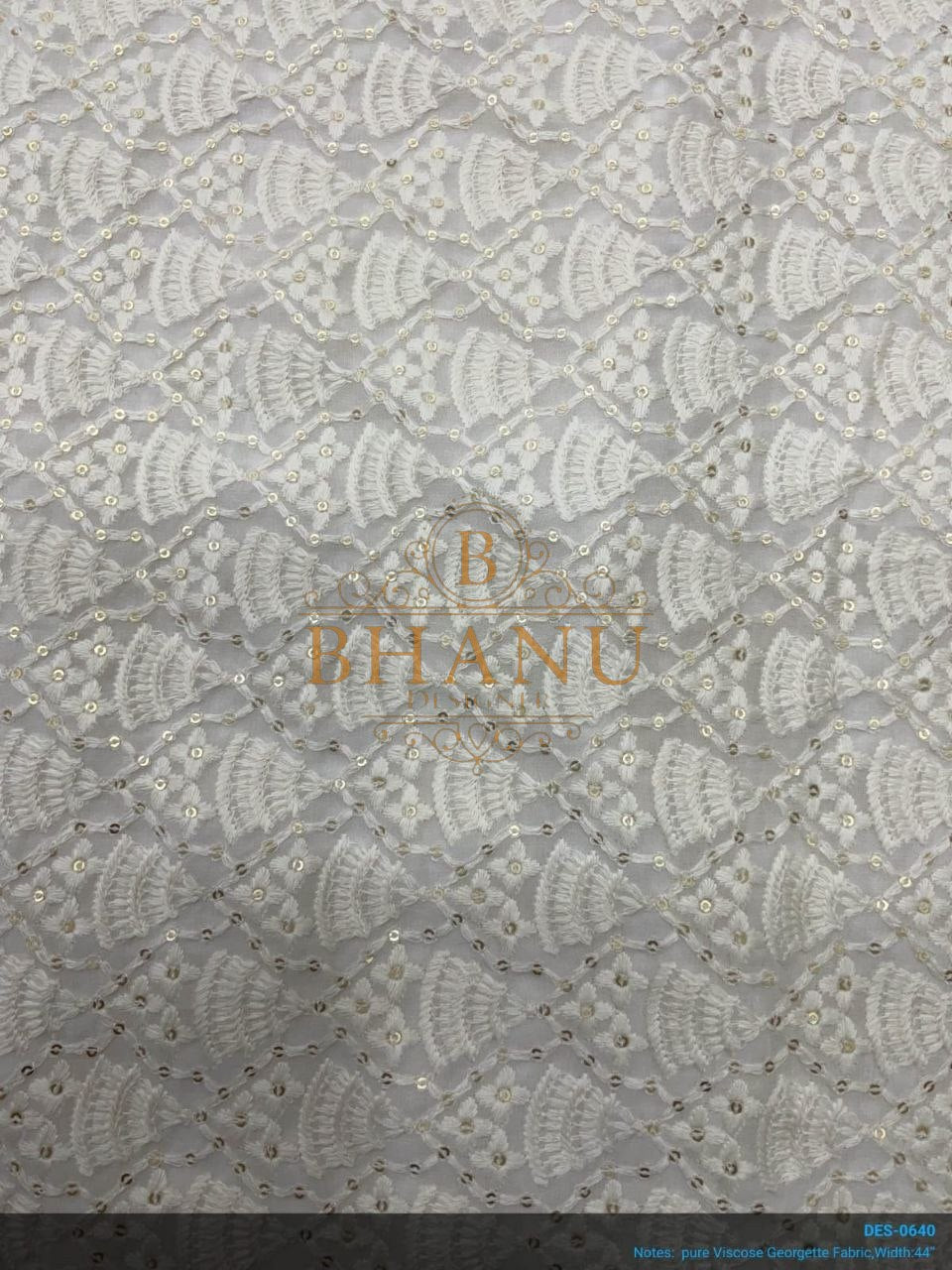 Ivory with tonal scallop work - fabric by the metre
