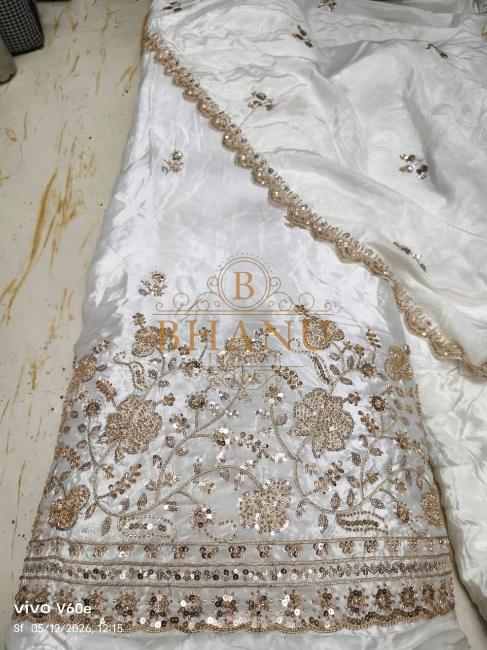 White satin with a gold floral border - fabric by the metre