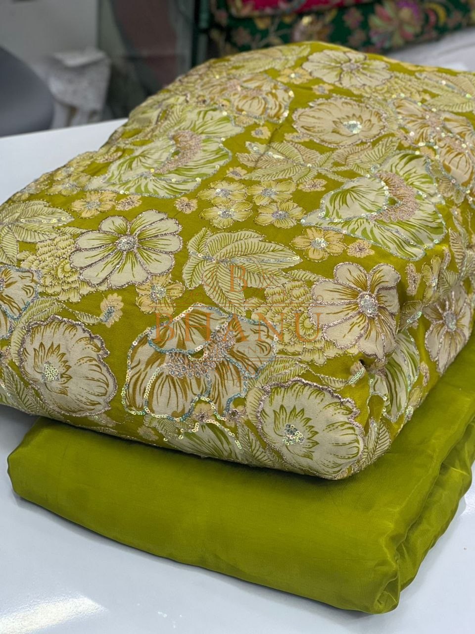 Olive with tonal floral over lime - fabric by the metre