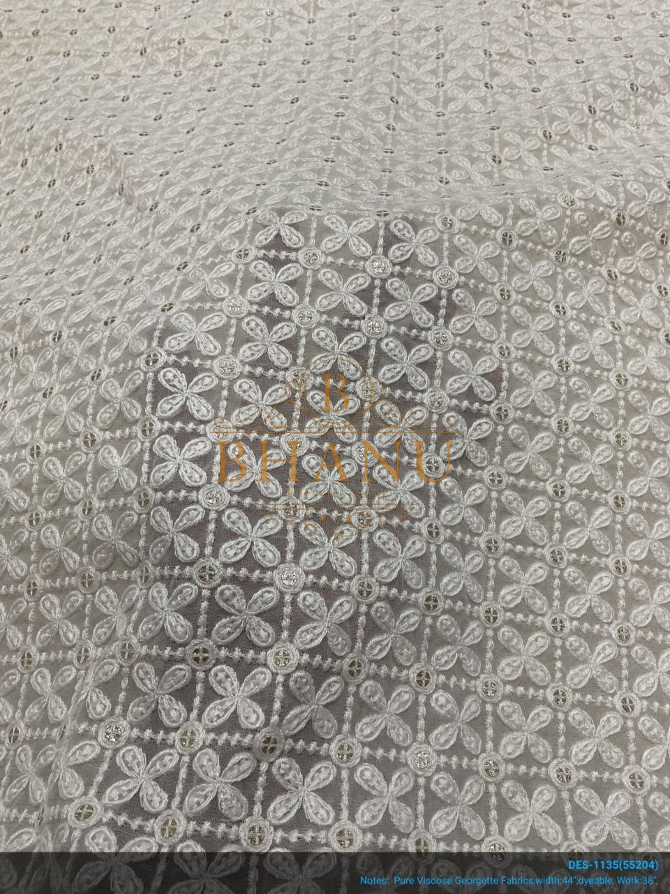 Ivory with tonal floral cutwork - fabric by the metre