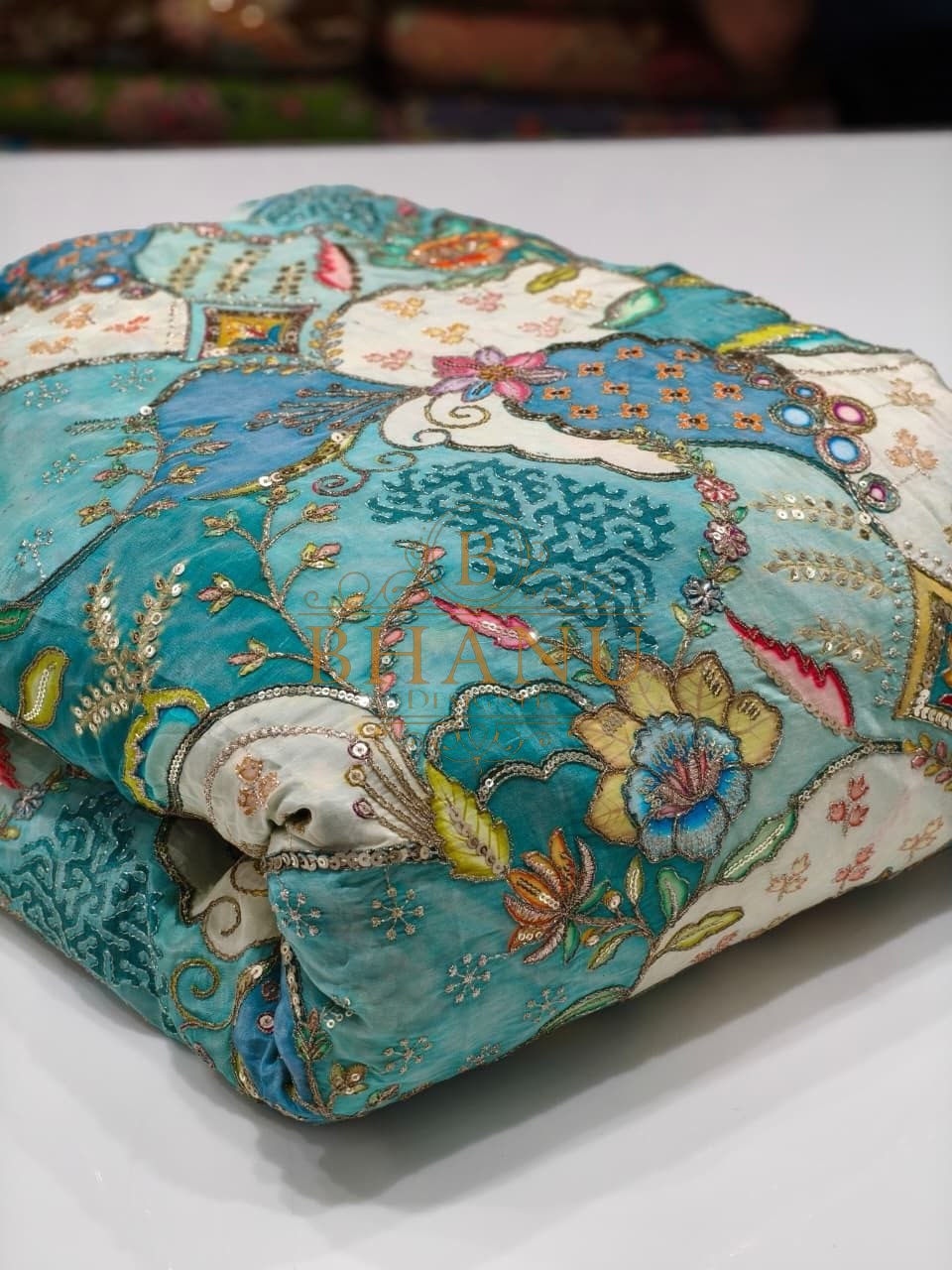 Teal with a multicolour Mughal print - fabric by the metre