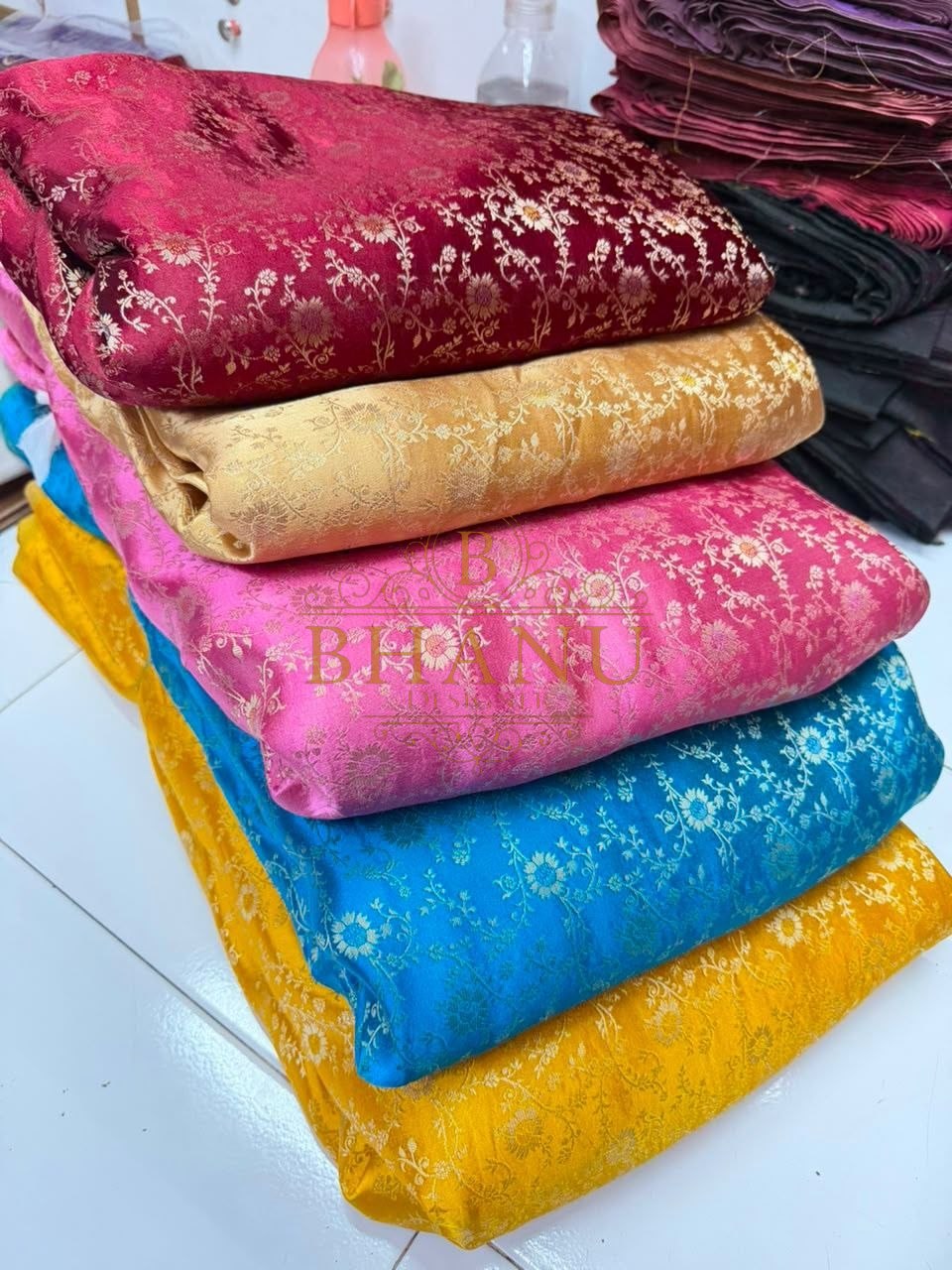 Brocade in pink, gold, blue and yellow - fabric by the metre