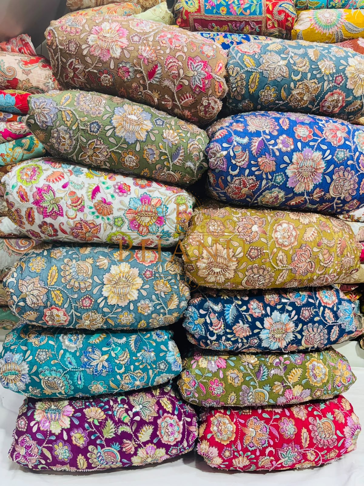 Dense multicoloured floral and paisley work with beads and sequins