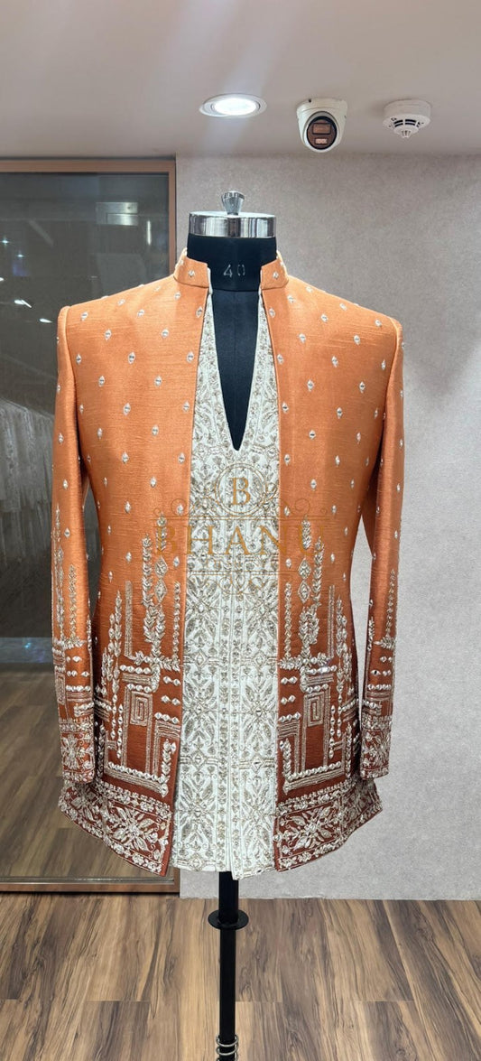 Orange sherwani with ivory embroidered panel and mandarin collar