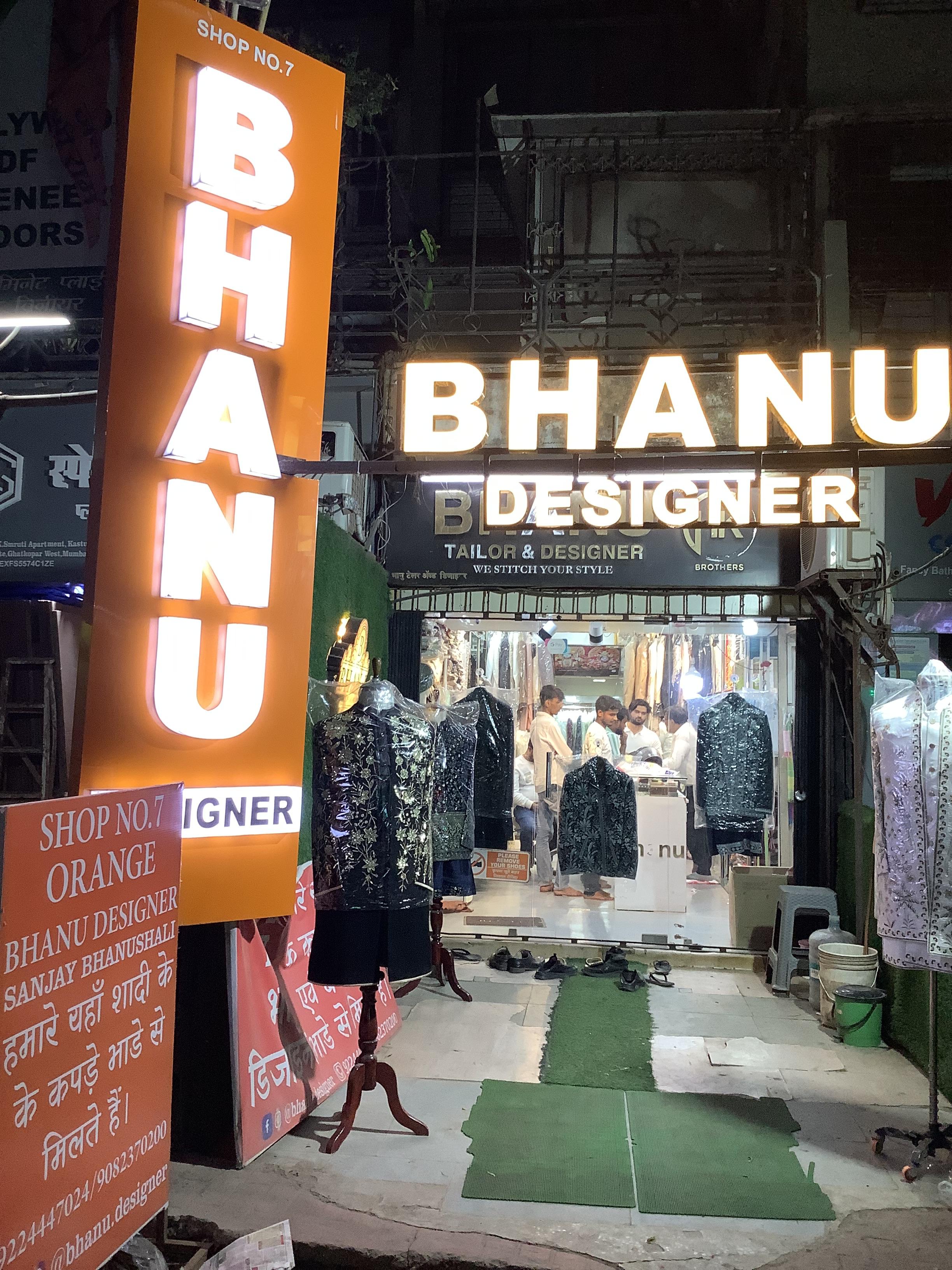 Bhanu Designer store entrance with bright signage in a market setting