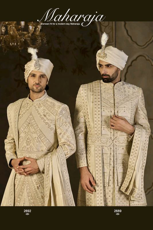 Two men in traditional Maharaja attire standing against a dark background with 'Maharaja' branding.