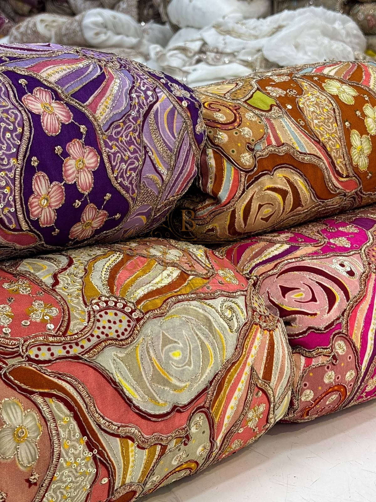 All four colours of this crepe: purple, rust, coral-grey and rani pink
