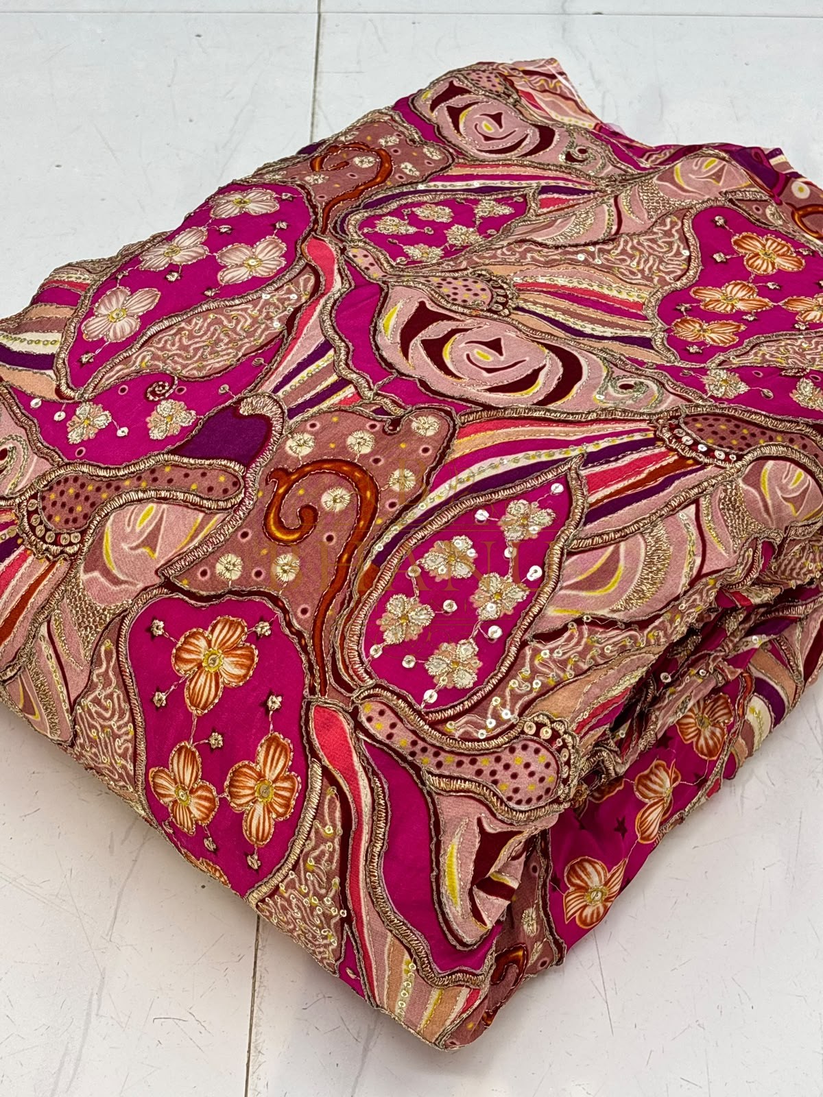 Rani pink crepe with printed roses, gold cording and sequins