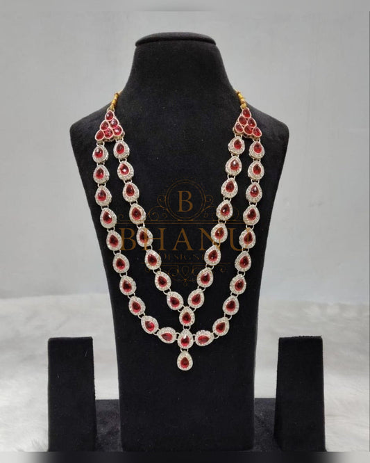 Mala necklace shown on a display stand