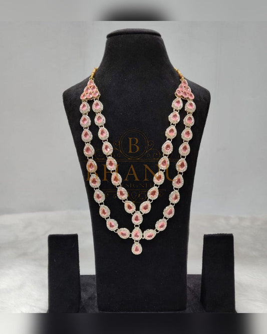 Mala necklace shown on a display stand
