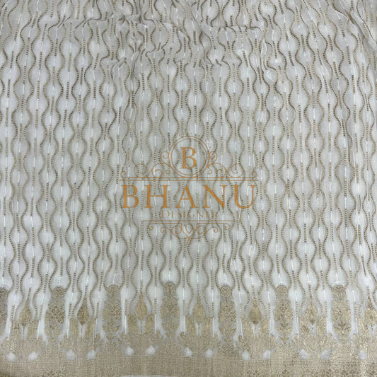 Ivory with fine gold wave and scatter work - fabric by the metre