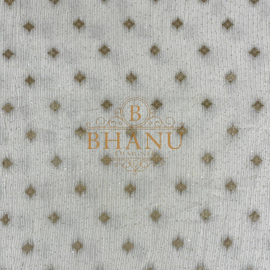 Ivory with scattered gold diamond butti - fabric by the metre