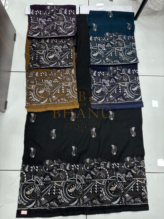 Bandhani-style work in black, mustard and navy - fabric by the metre