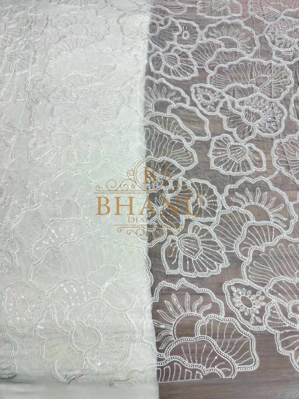 Ivory with large floral cutwork on net - fabric by the metre