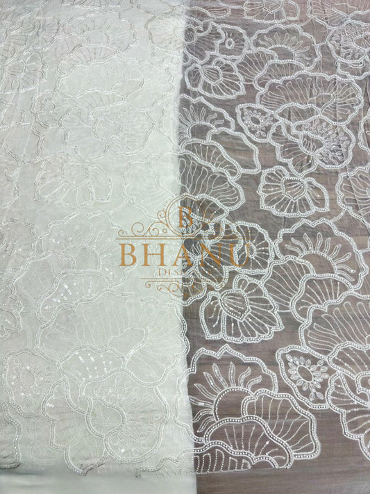 Ivory with large floral cutwork on net - fabric by the metre
