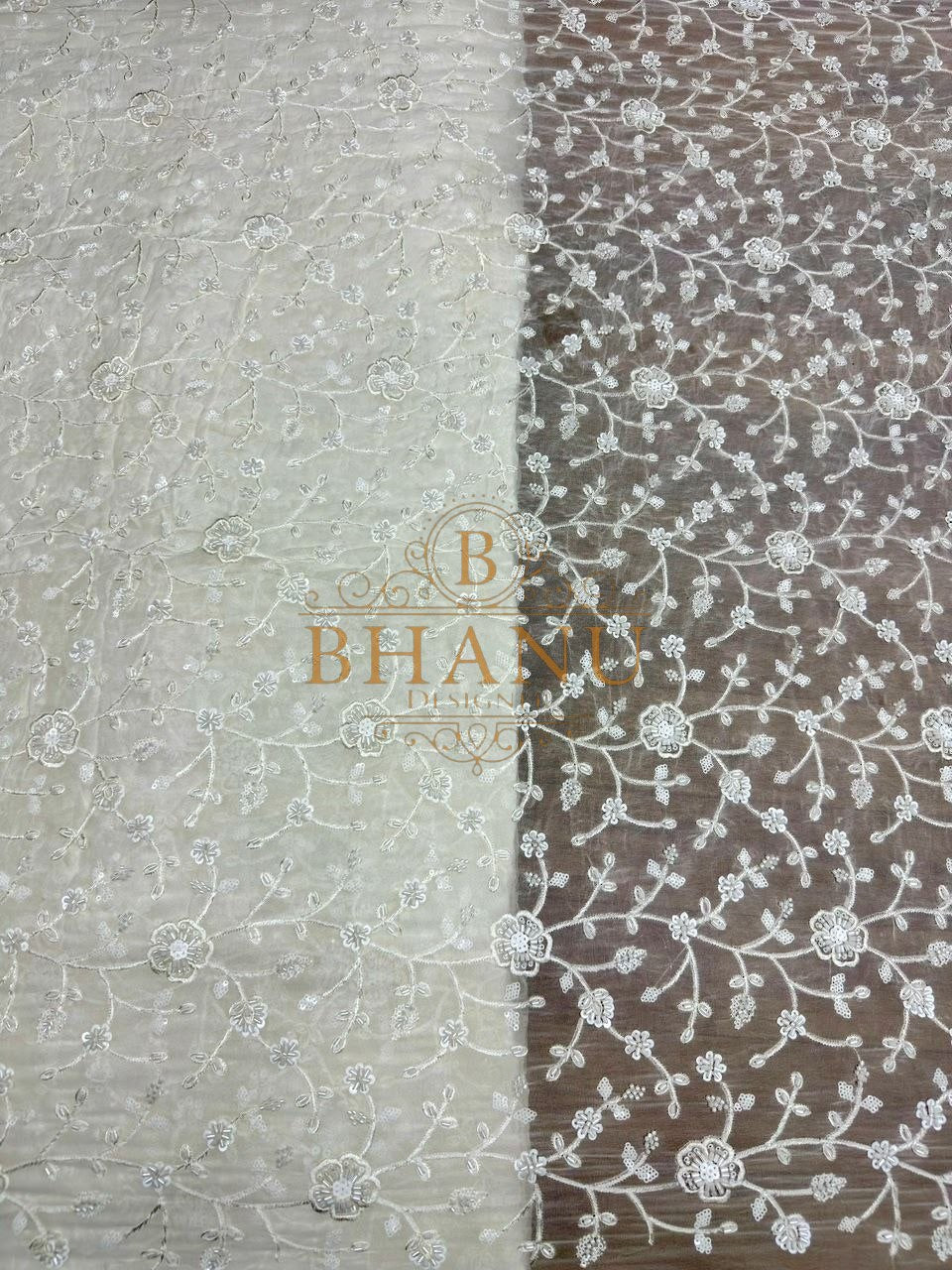 Ivory with fine floral embroidery on net - fabric by the metre