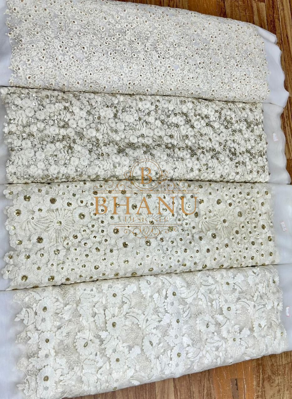 Ivory with sequin and mirror bands - fabric by the metre