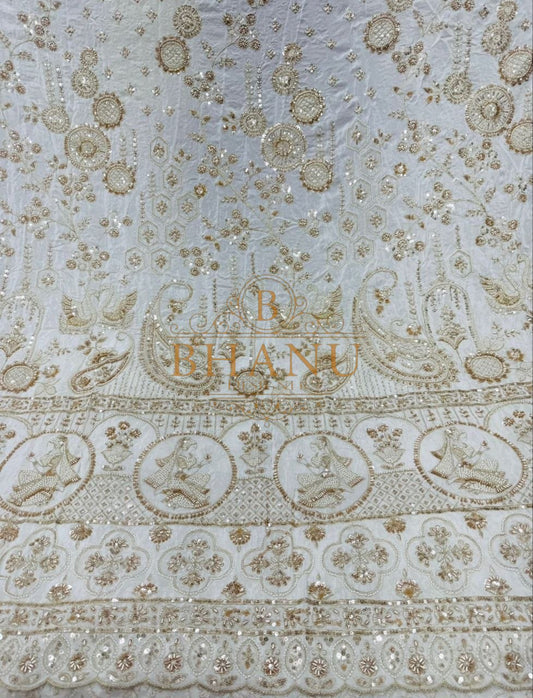 Ivory with gold peacock and paisley border - fabric by the metre