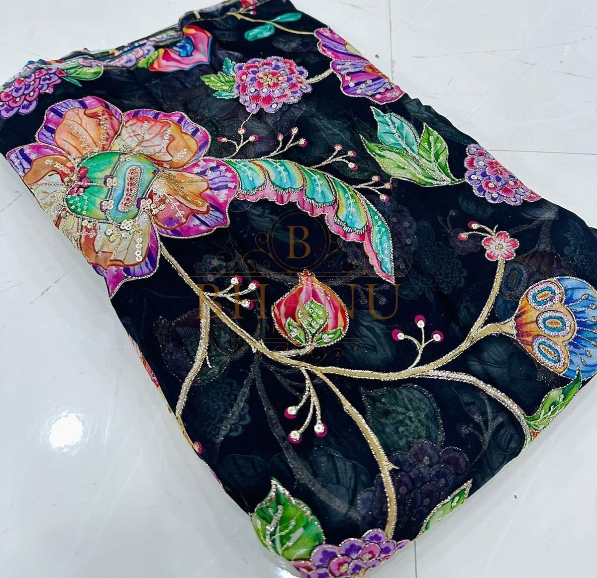 Black with bright multicolour floral embroidery - fabric by the metre