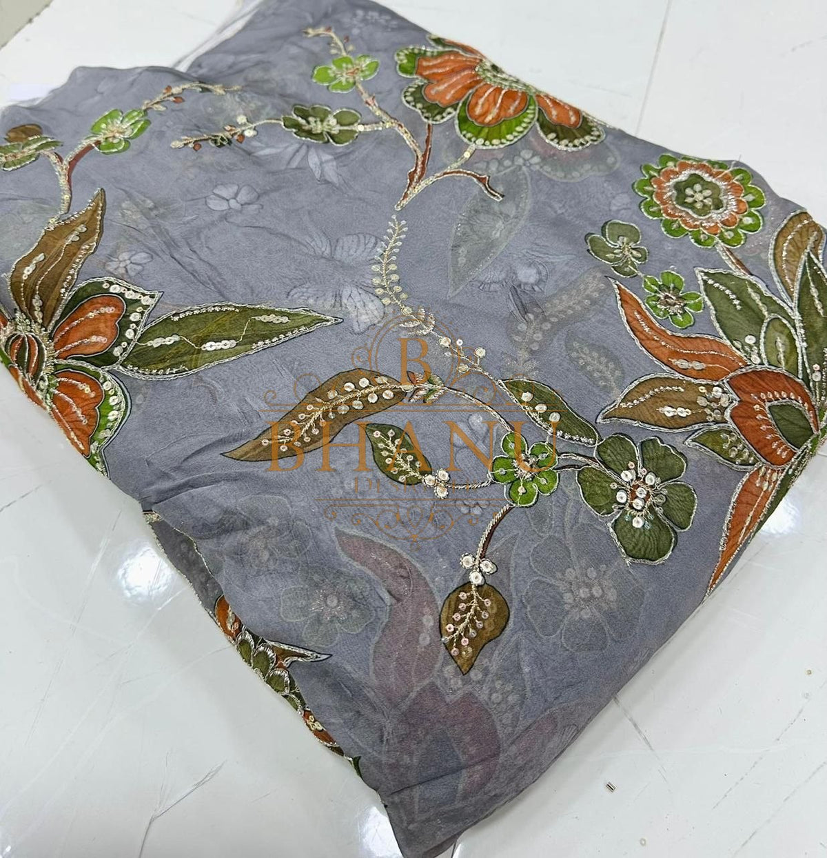 Grey with orange and olive leaf embroidery - fabric by the metre