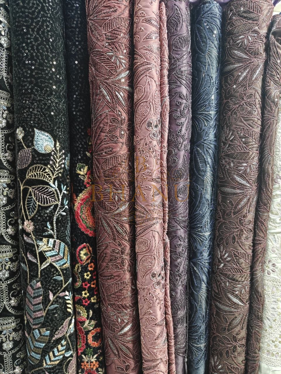Dark florals and textured weaves on the roll - fabric by the metre