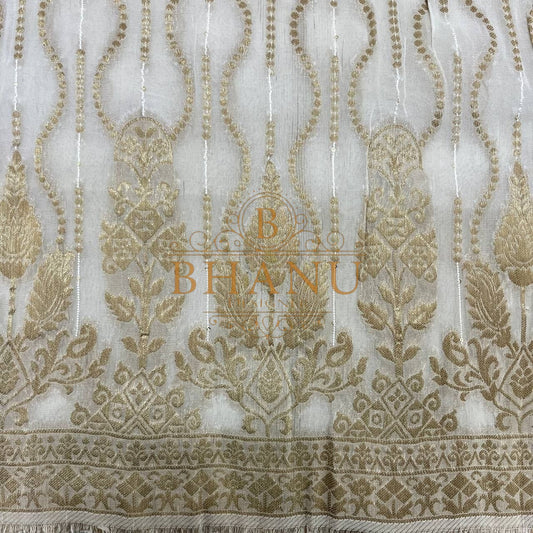 Ivory with gold teardrop columns and a heavy border - fabric by the metre