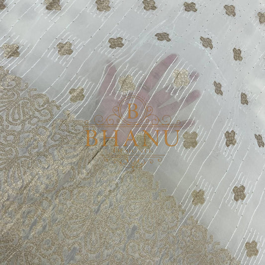 Ivory with gold butti and a gold border - fabric by the metre