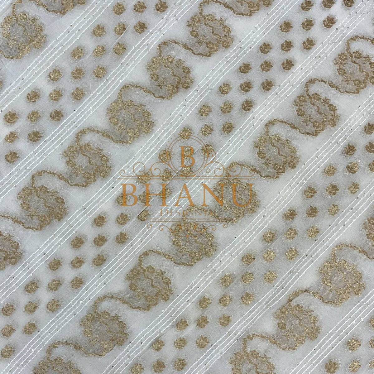 Ivory with gold floral bands set on the diagonal - fabric by the metre