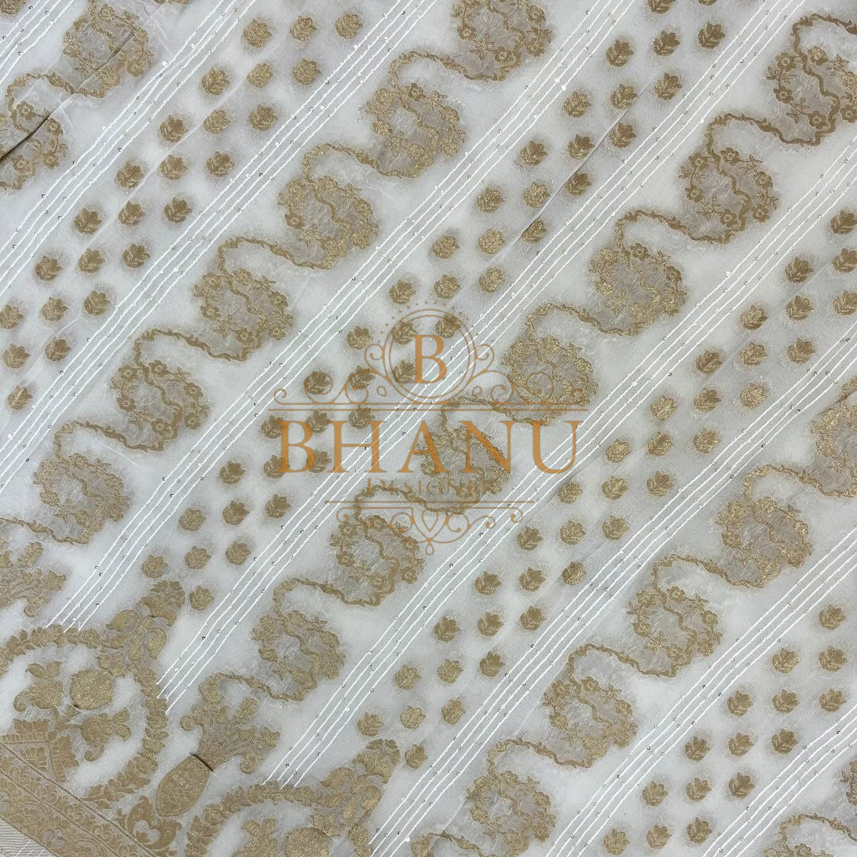 Ivory with gold floral bands on the diagonal - fabric by the metre