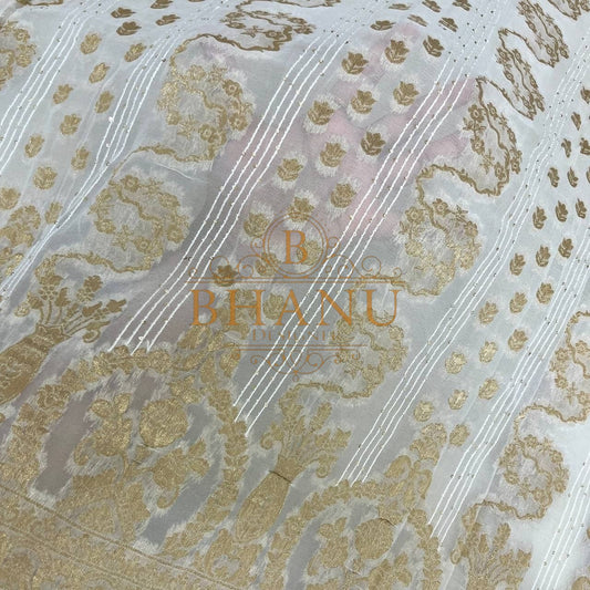 Ivory with gold work on the diagonal - fabric by the metre