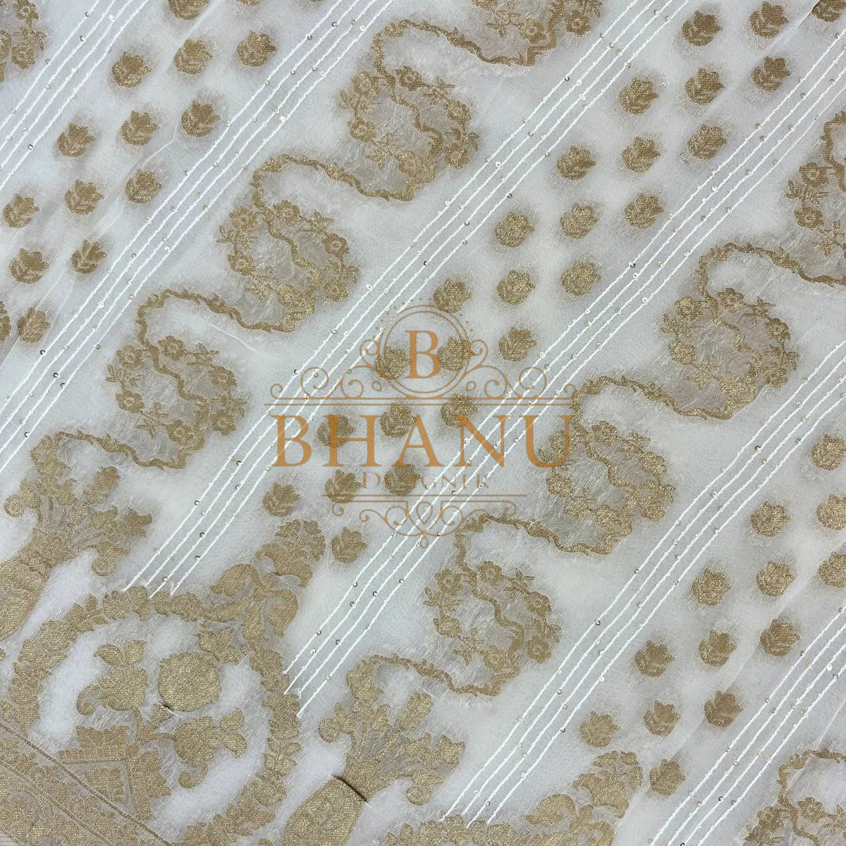 Ivory with gold diagonal banding - fabric by the metre