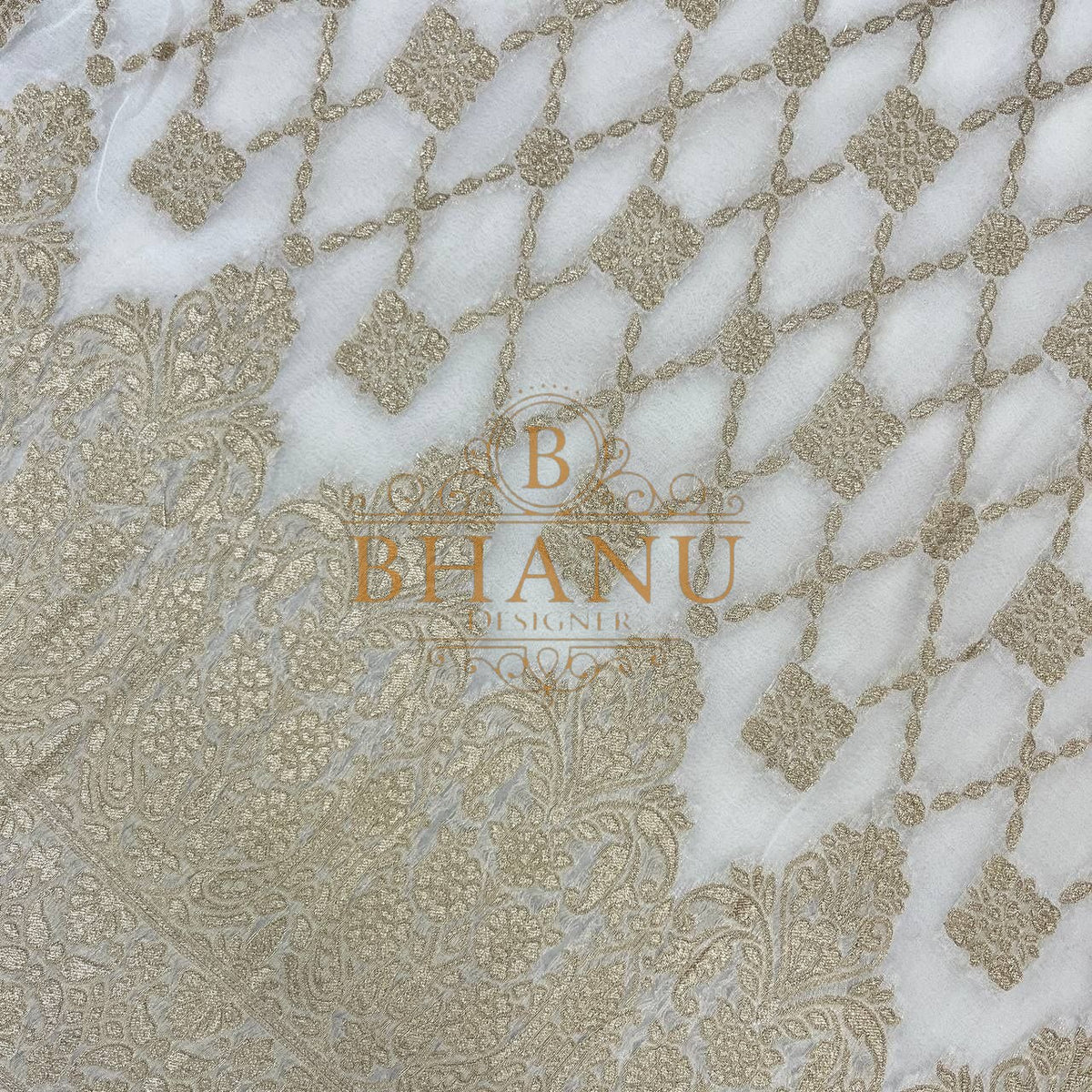 Ivory with gold lattice over a floral band - fabric by the metre