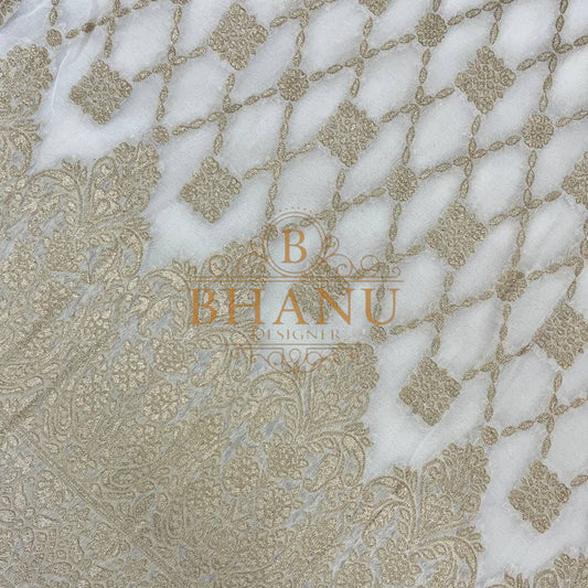 Ivory with gold lattice over a floral band - fabric by the metre