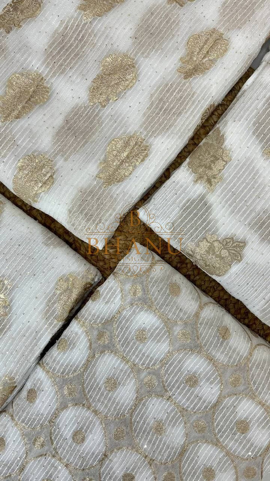 Ivory with gold butti, folded from the roll - fabric by the metre