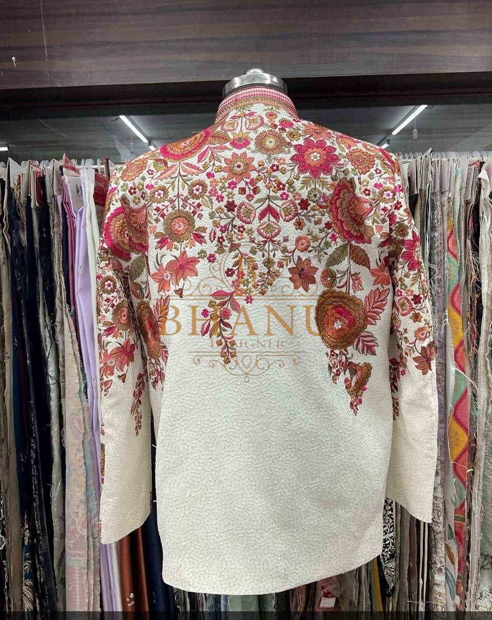 Ivory with red and pink floral embroidery across the shoulder - sherwani