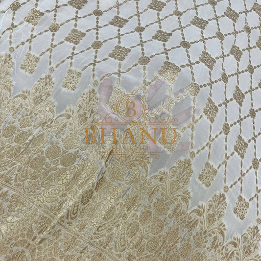 Ivory with gold lattice on a sheer ground - fabric by the metre