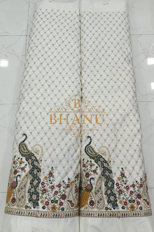 White with peacock and floral work at the hem - unstitched panel