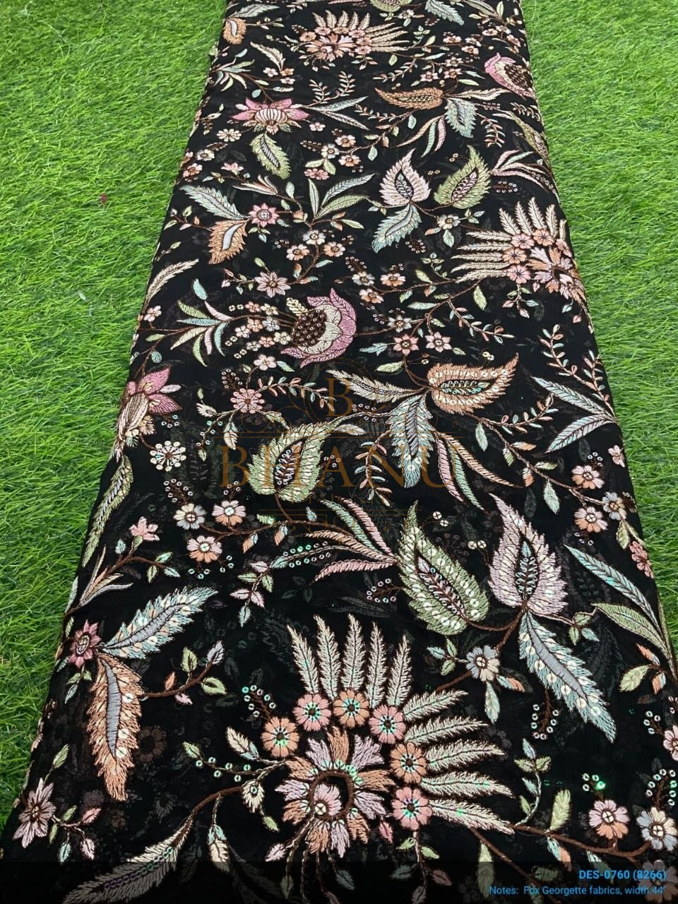 Black with pastel floral embroidery - fabric by the metre