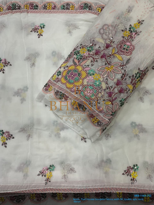 White with multicolour floral and a worked border - fabric by the metre