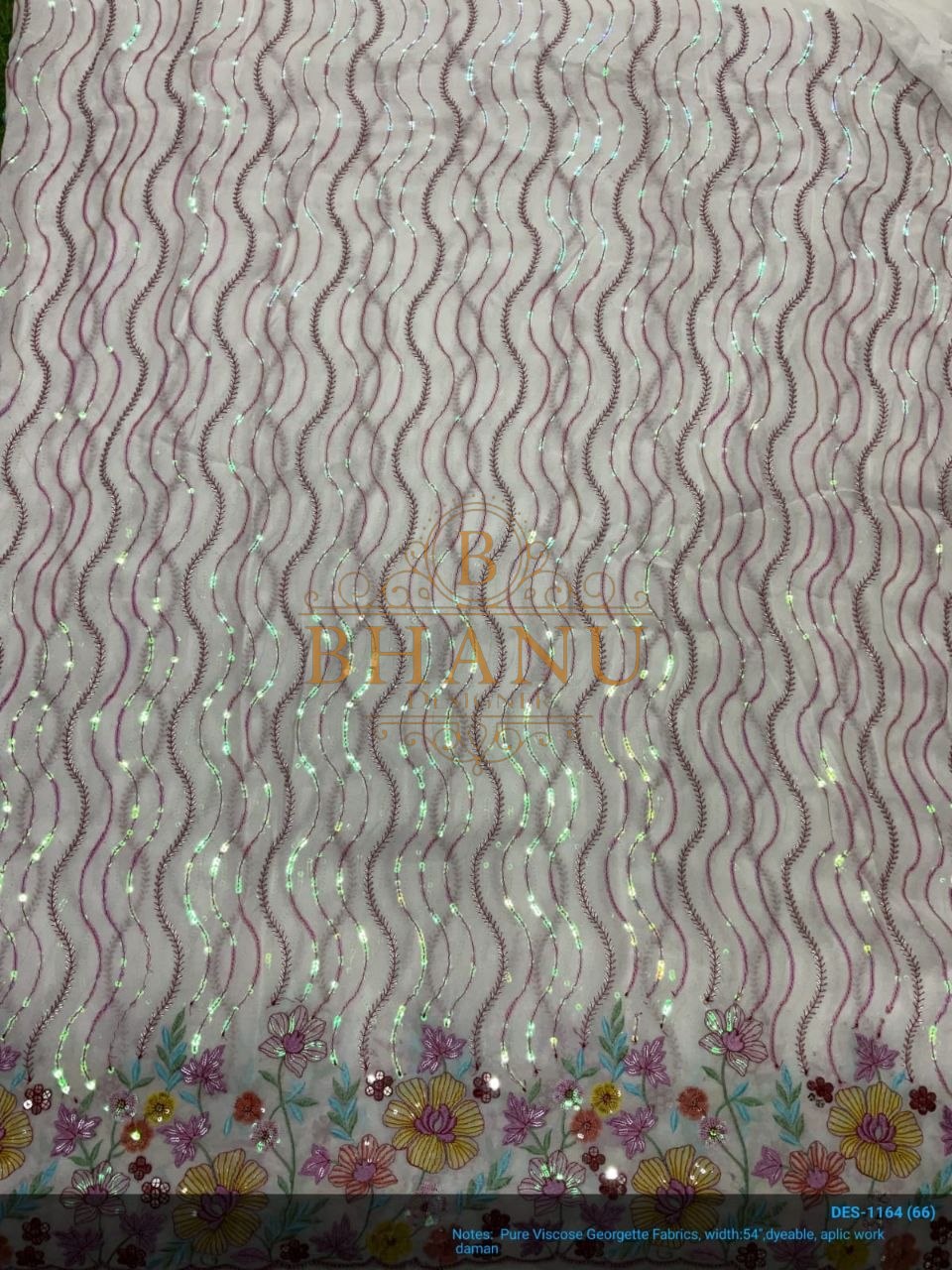 White with sequin wave work - fabric by the metre
