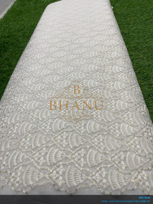 Ivory with tonal work, on the roll - fabric by the metre