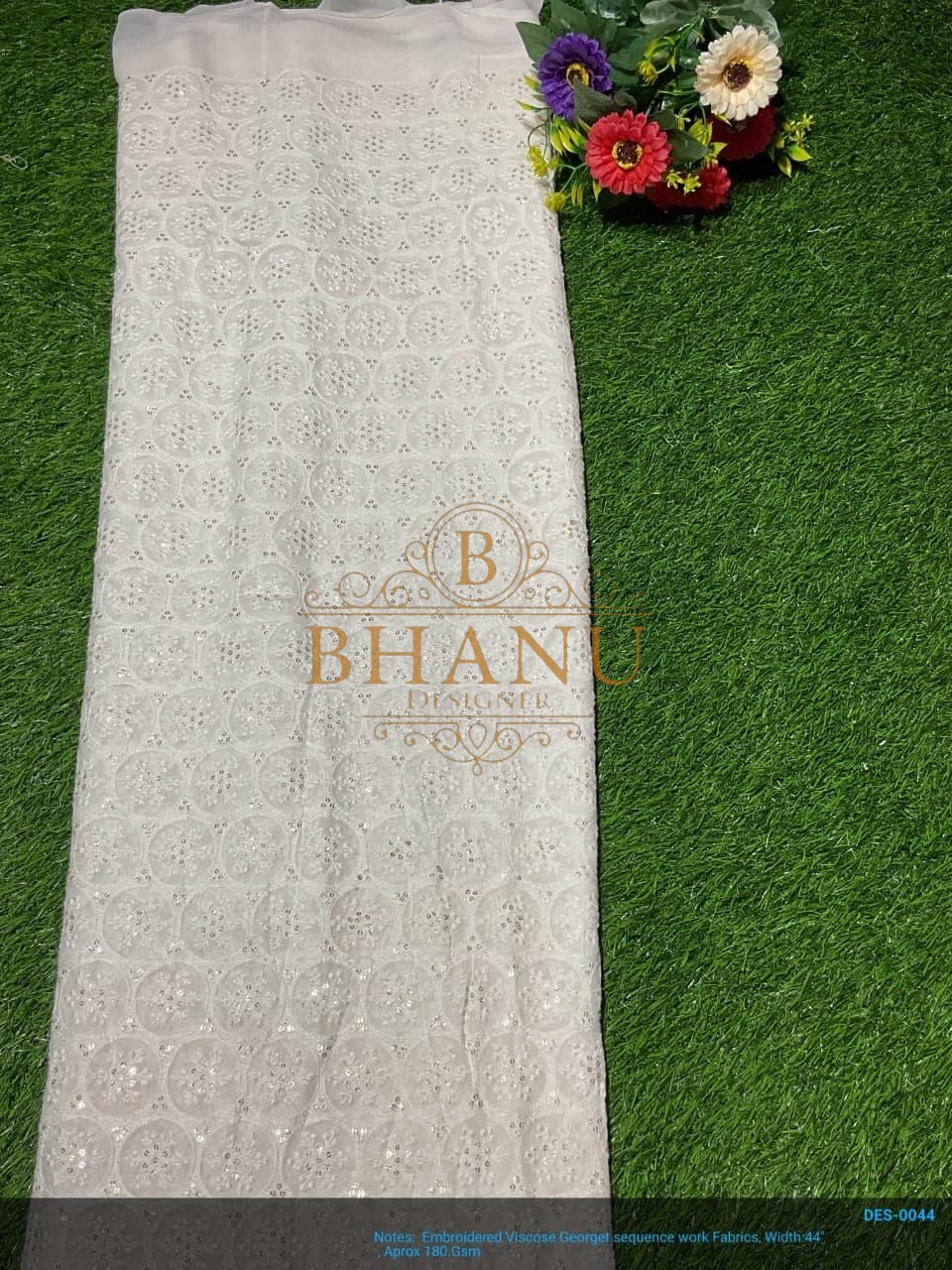 Ivory with fine gold work, on the roll - fabric by the metre