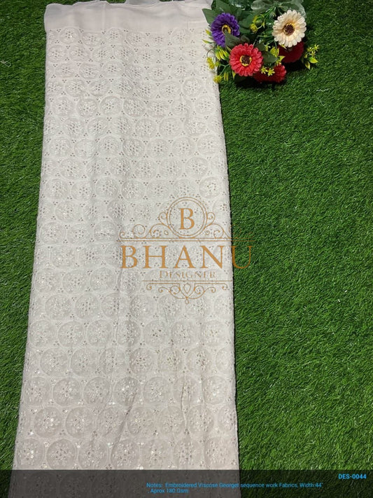 Ivory with fine gold work, on the roll - fabric by the metre