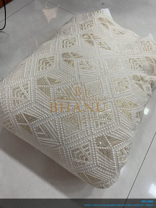 Ivory with geometric cutwork - fabric by the metre