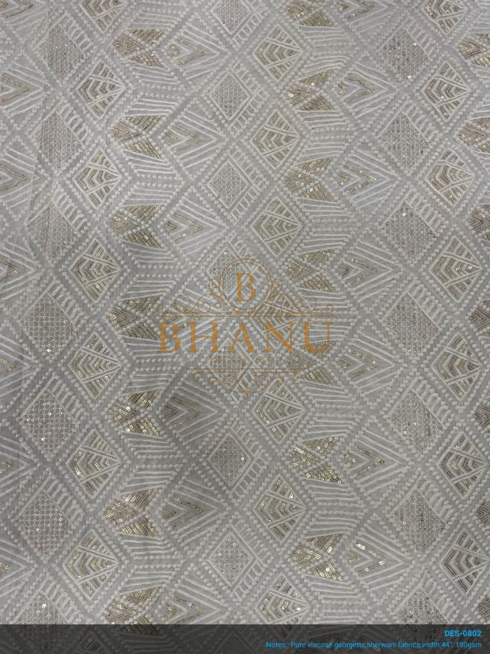 Ivory with tonal geometric work - fabric by the metre