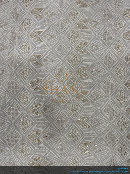 Ivory with tonal geometric work - fabric by the metre